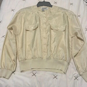 Vintage windbreaker like pale yellow pullover top